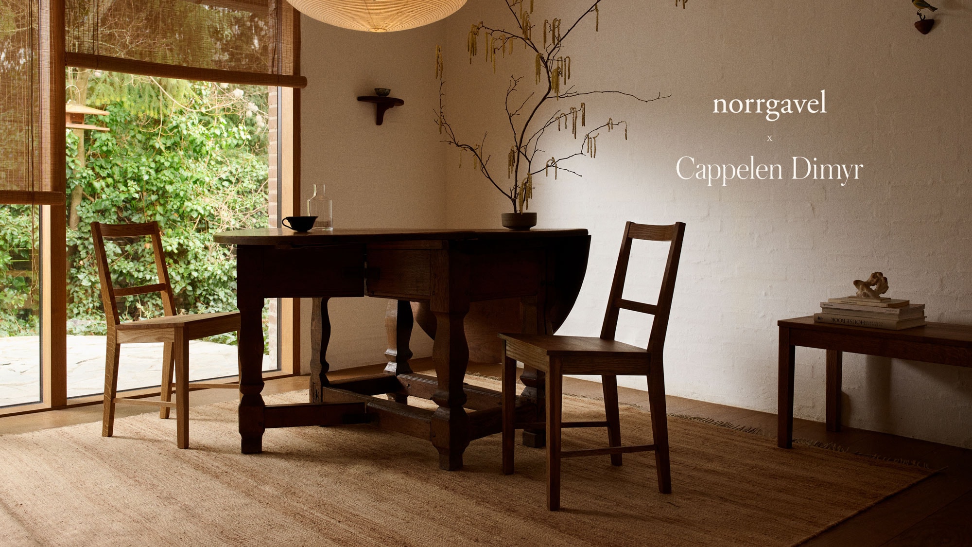 Dining room with table and chairs on a large hemp rug