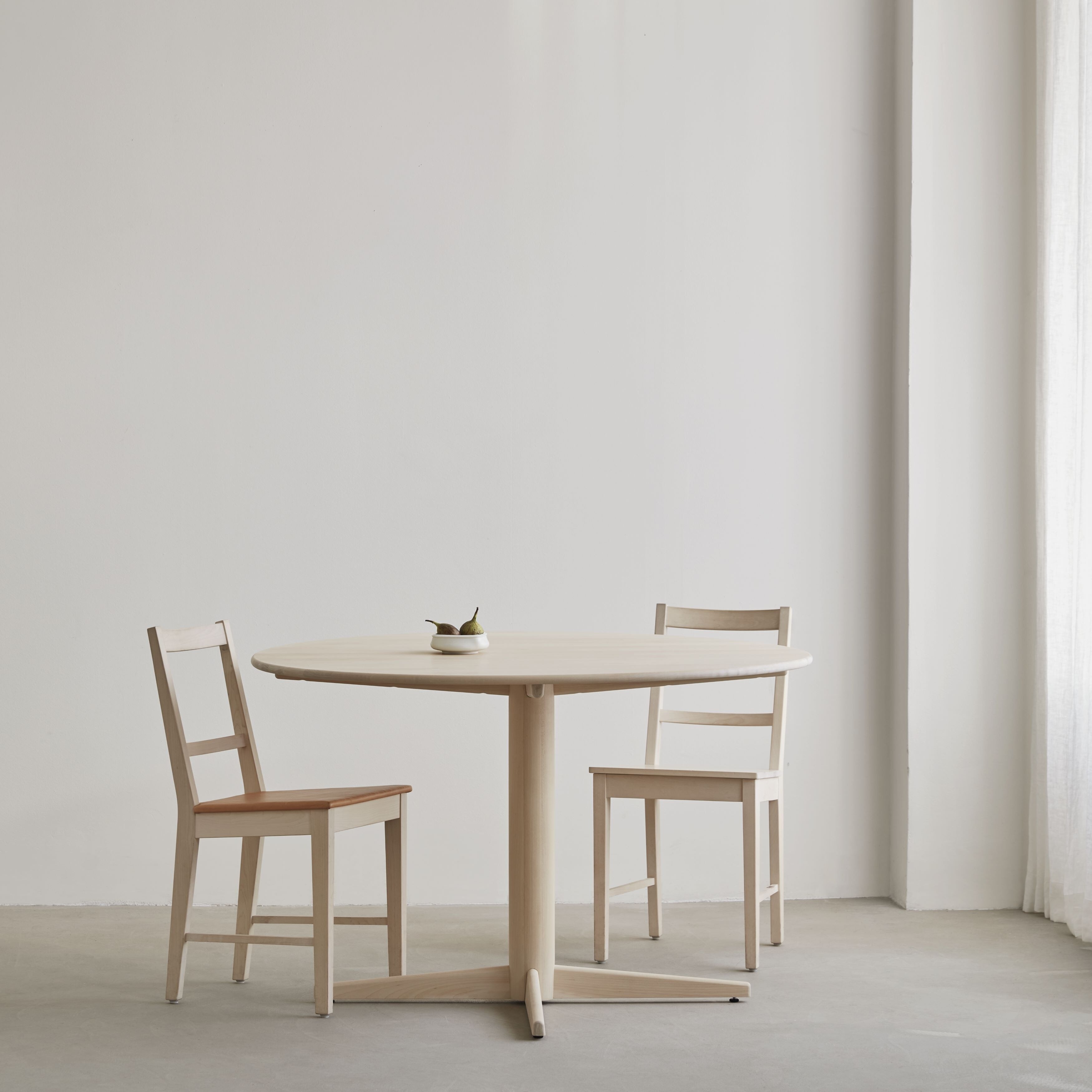 dining table and two chairs in birch
