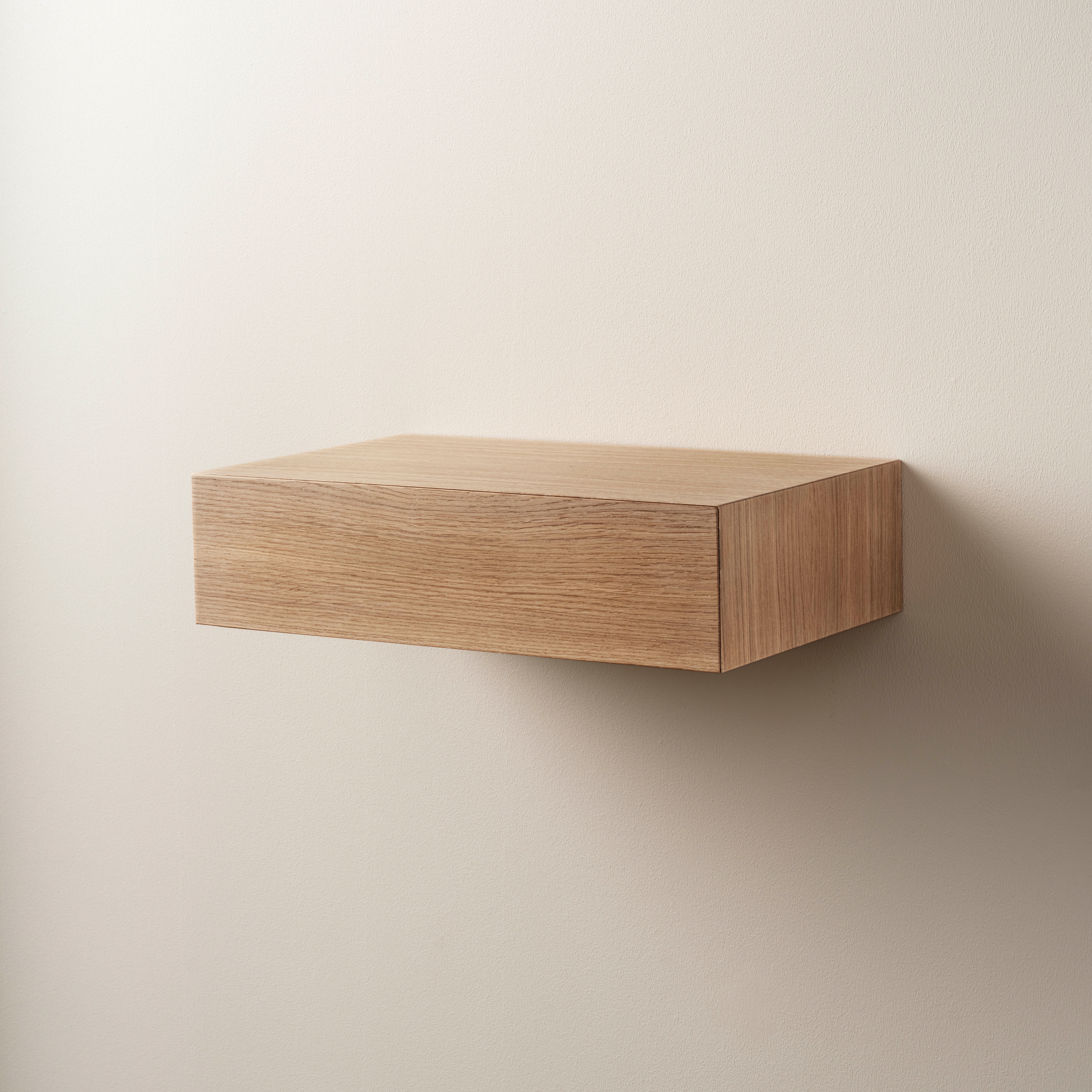Shelf with drawer